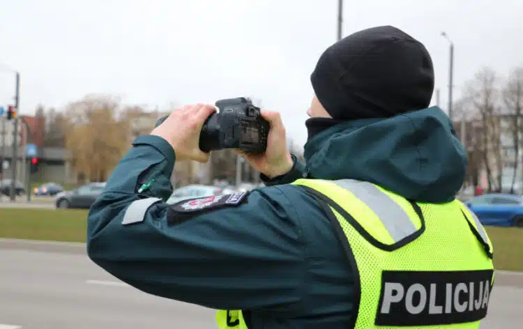 policijos pareigunas fotoaparatas