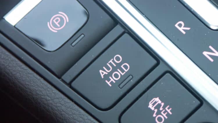 autohold mygtukas automobilyje