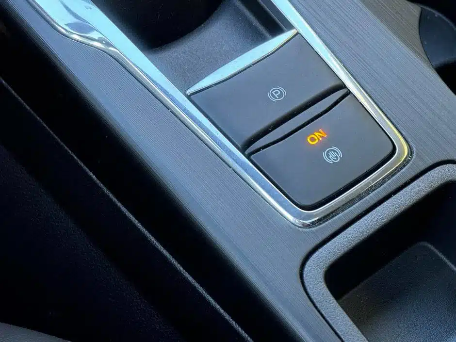 auto hold mygtukas