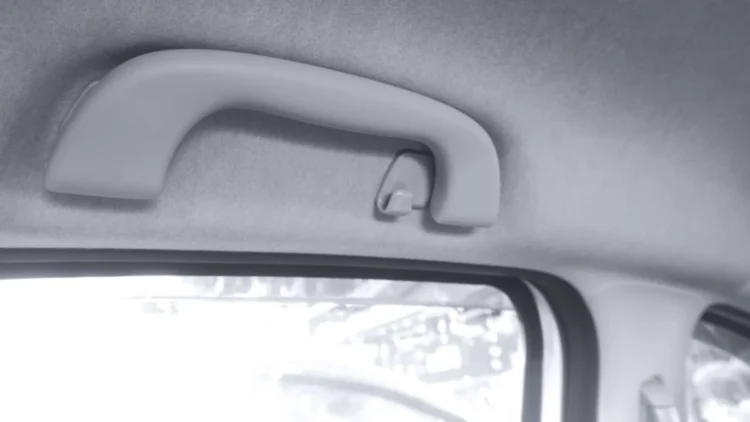 rankena virs automobilio lango